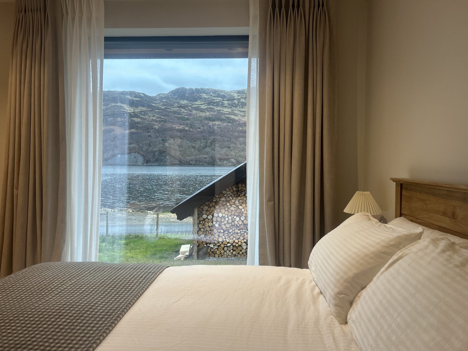 Primary king bedroom with loch view window