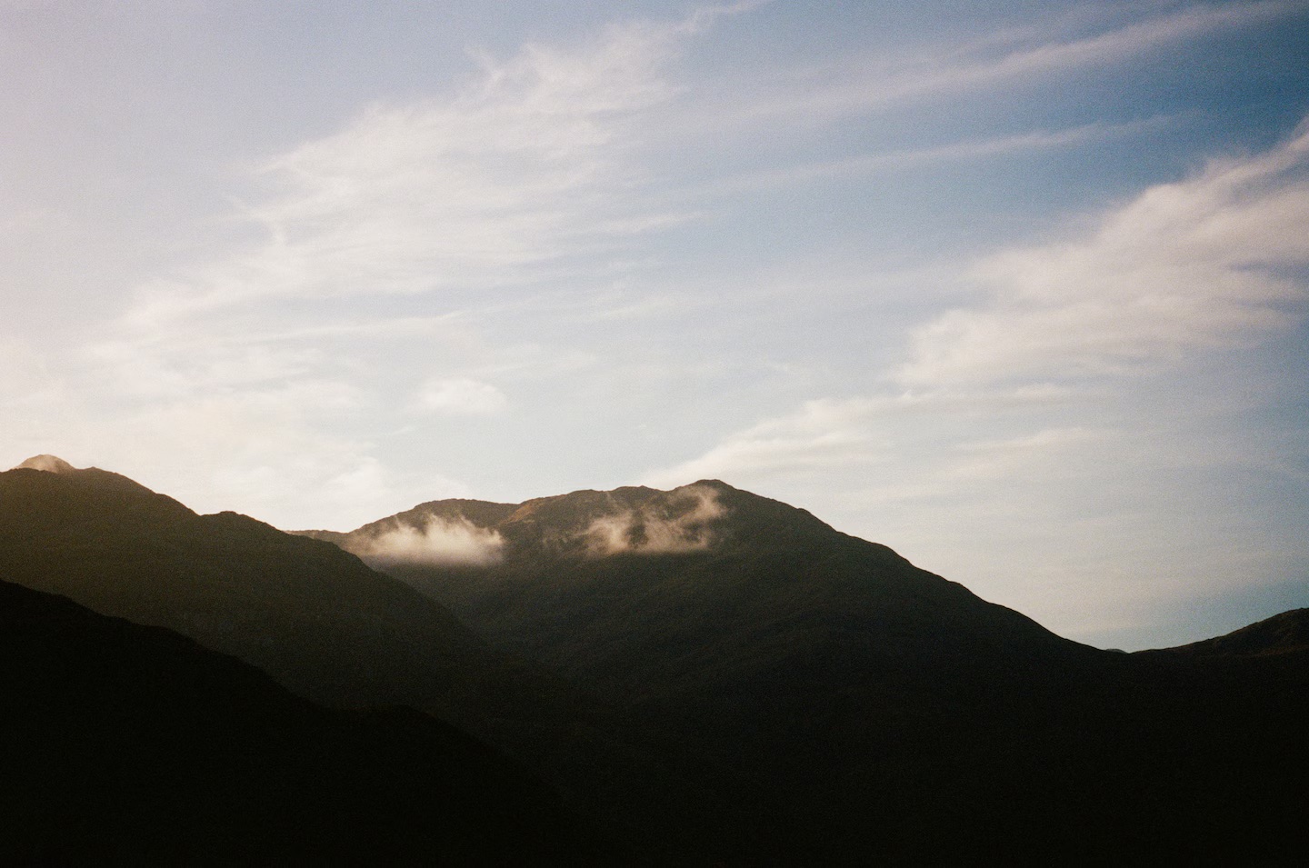Kintail mountain silhouette with low cloud at dusk